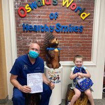 oswald the beaver with patient and dentist 18