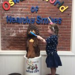 oswald the beaver with patient and dentist 12